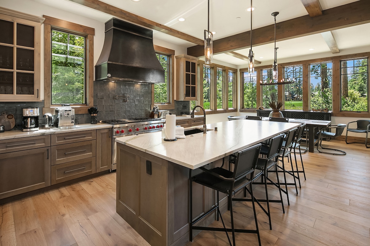 Chef's kitchen with large island and modern appliances