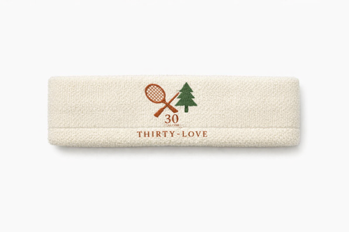Cream terry cloth headband with Thirty-Love branding